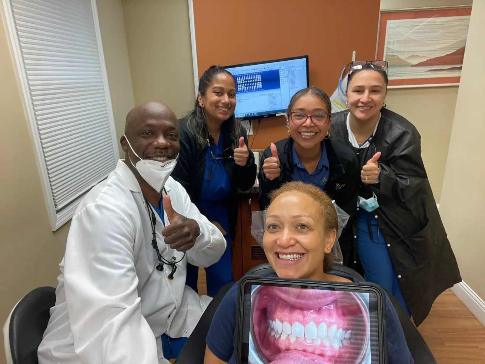The South Orange Dental Center team reviewing a digital intraoral scan on a tablet